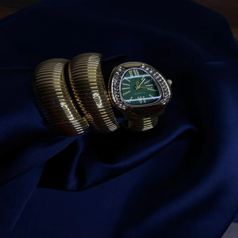 luxury gold spiral strap watch